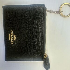Coach Black Leather Keychain Wallet. 
 Great conditions. 💯 Authentic.